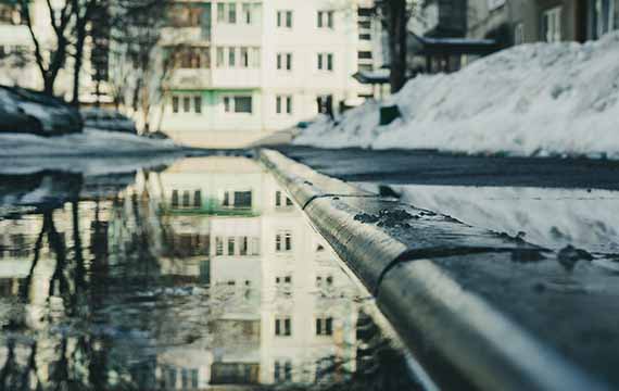Flooded street with snow