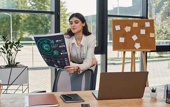 woman reading chart graph franchise business homework