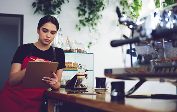 a girls working at a cafeteria