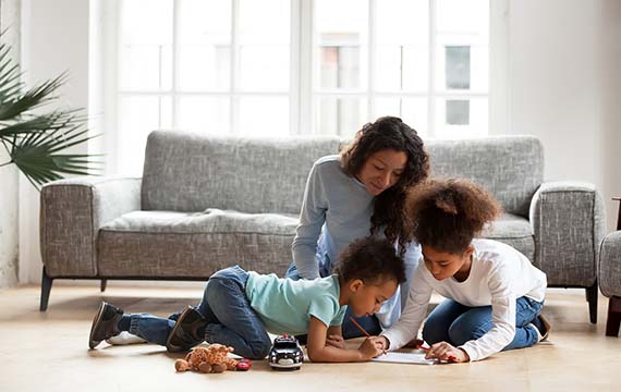 Mother and children playing
